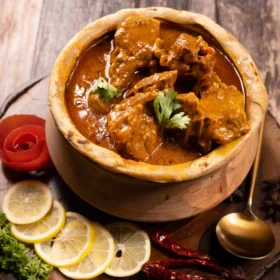 Dum handi ka gosht