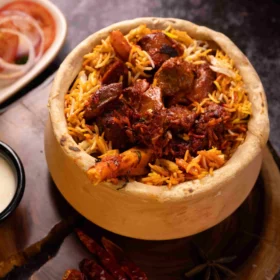 Kaccchay dum gosht ki biryani 